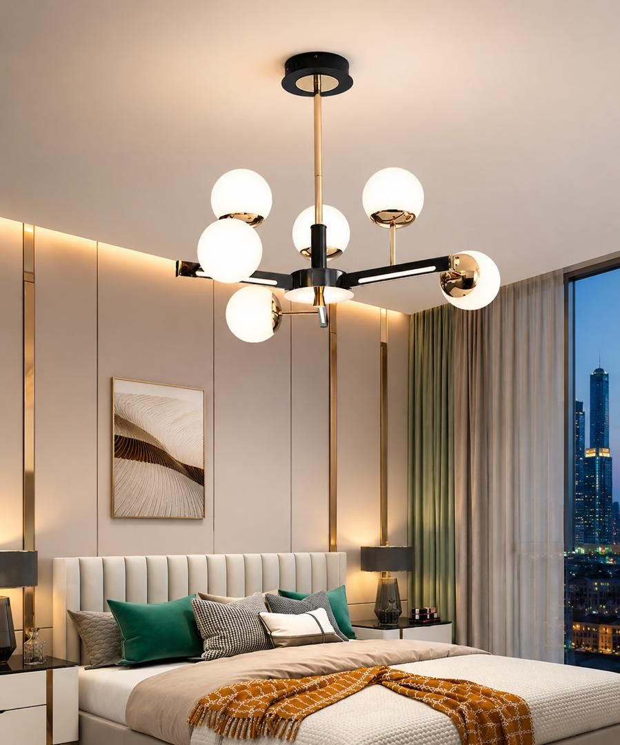 Multi-globe gold and black chandelier in a bedroom